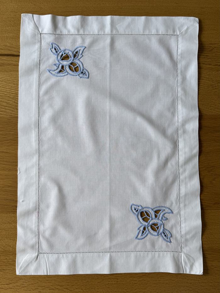 Vintage linen mat, blue cutwork corners