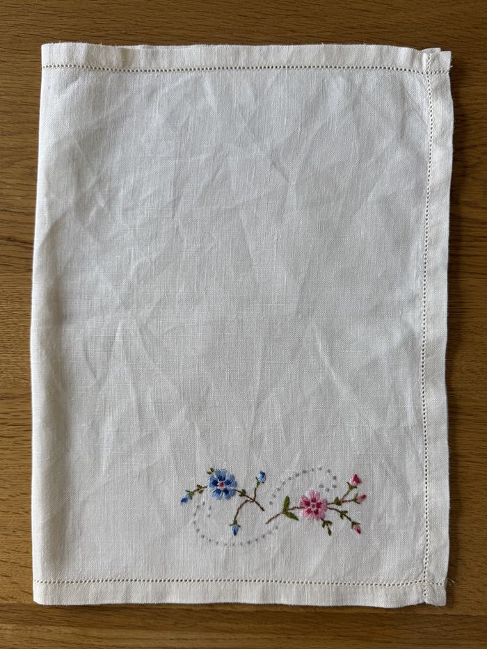Vintage linen mat, floral spray motif